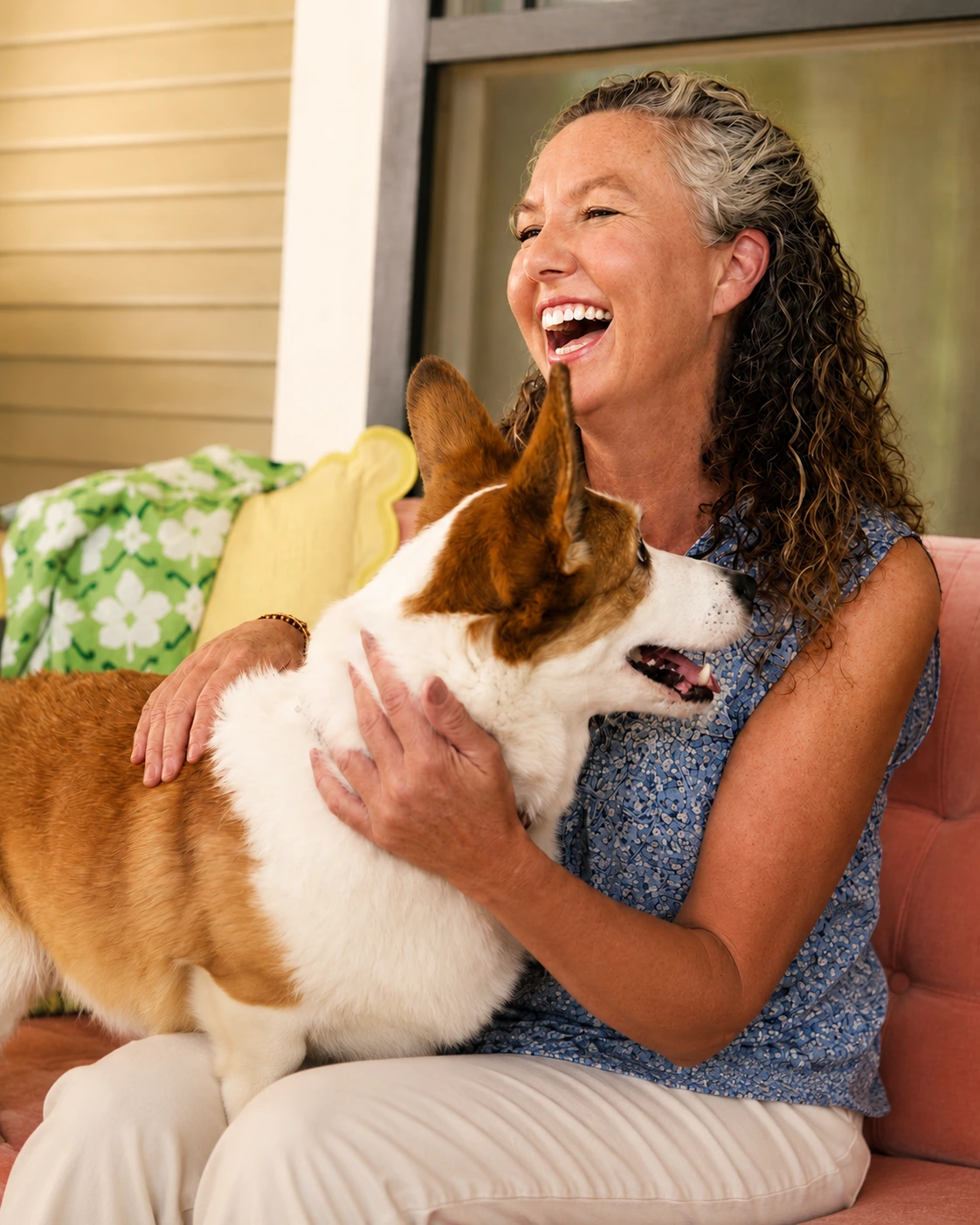 Woman relaxing at home with her dog