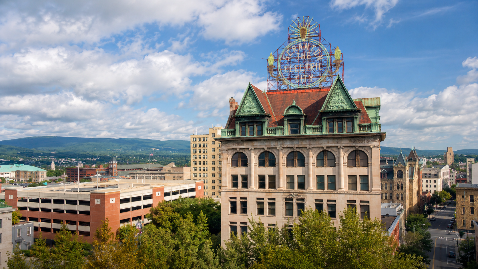 Downtown Scranton, Pennsylvania skyline with the illuminated "Scranton The Electric City" sign atop the Marketplace at Steamtown building